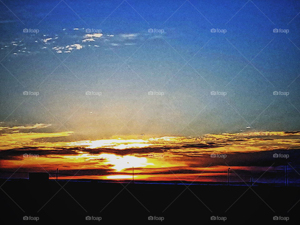 sun rays bursting through the clouds