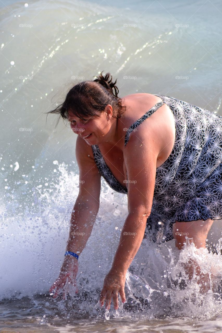 Woman enjoying on beach