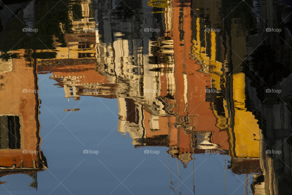 Reflection of houses in the water. 