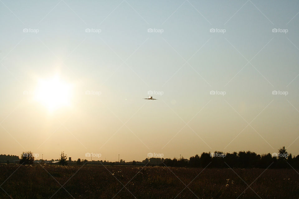 Airplane and sunset 