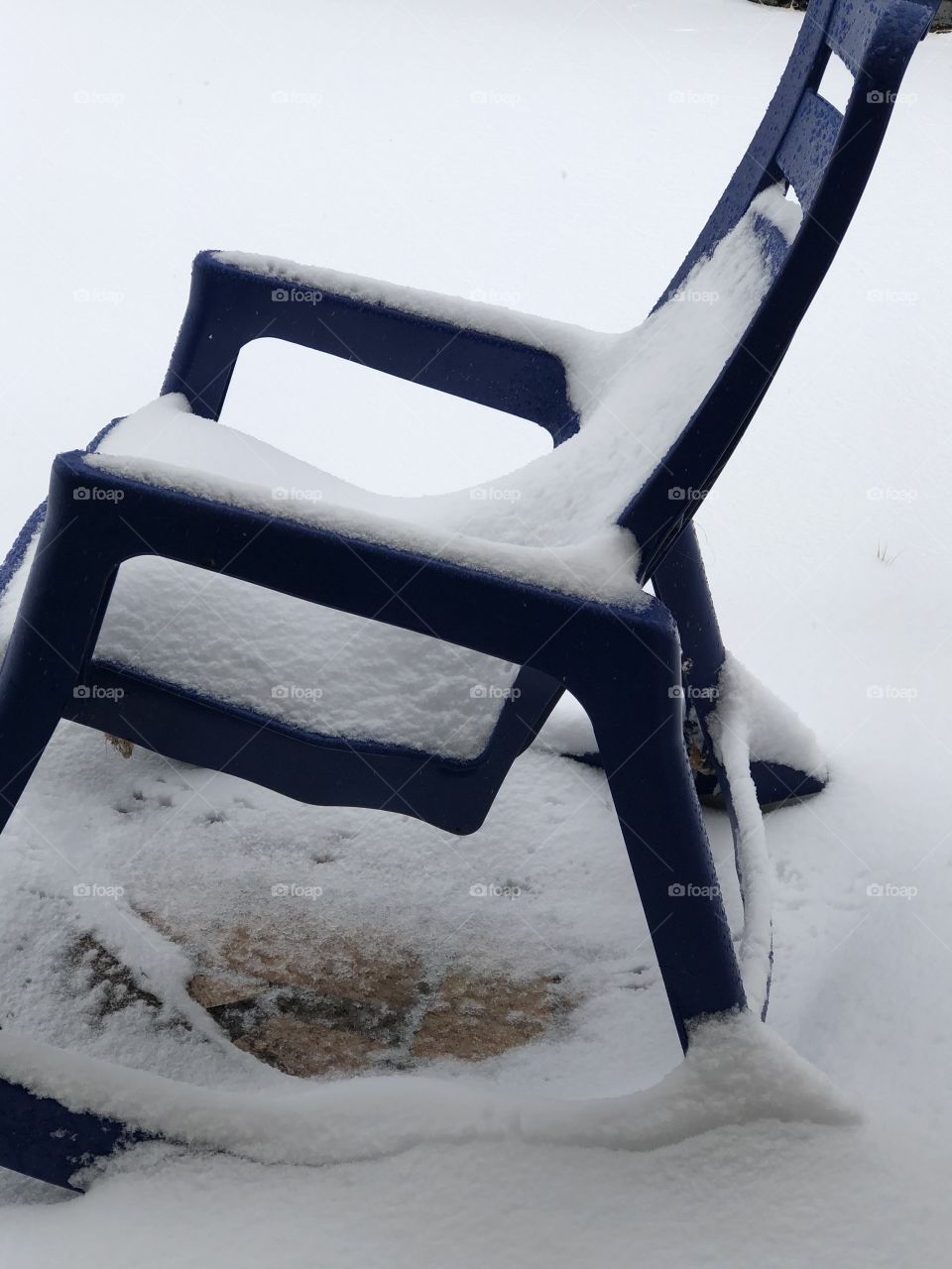 Patio chair and snow