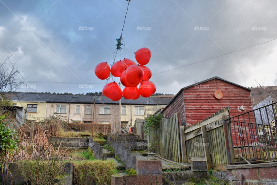 Love heart balloons caught on the line 