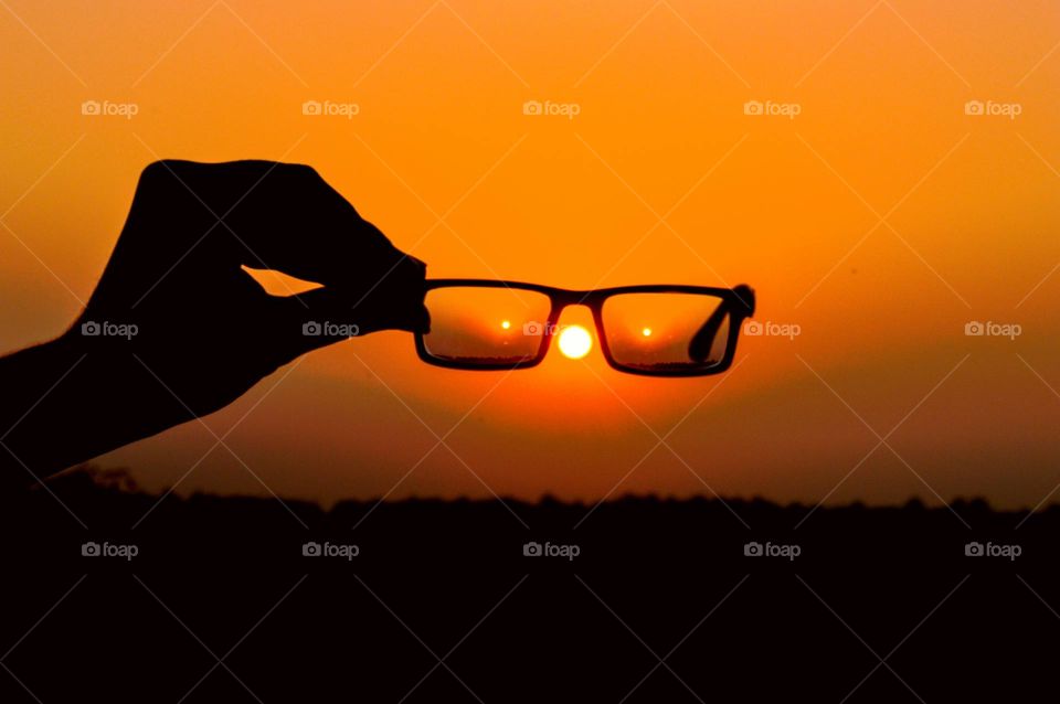 Reading glasses sunset sillowet