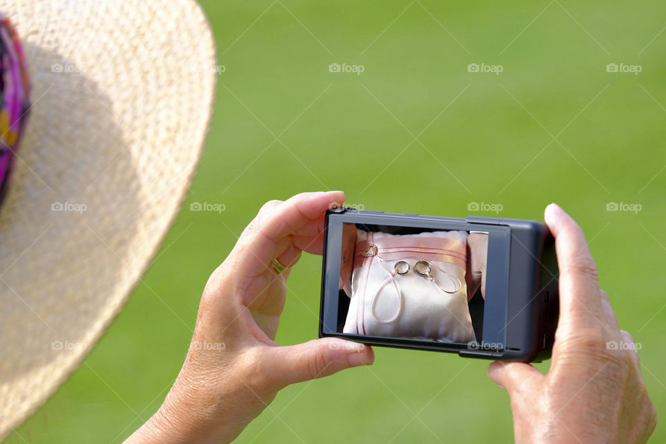 Phone. Camera phone Tourist taking a picture with a smartphone cell phone mobile phone camera 