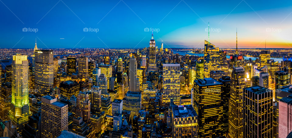 Manhattan at dusk. Manhattan at sunset taken from the Rockefeller building