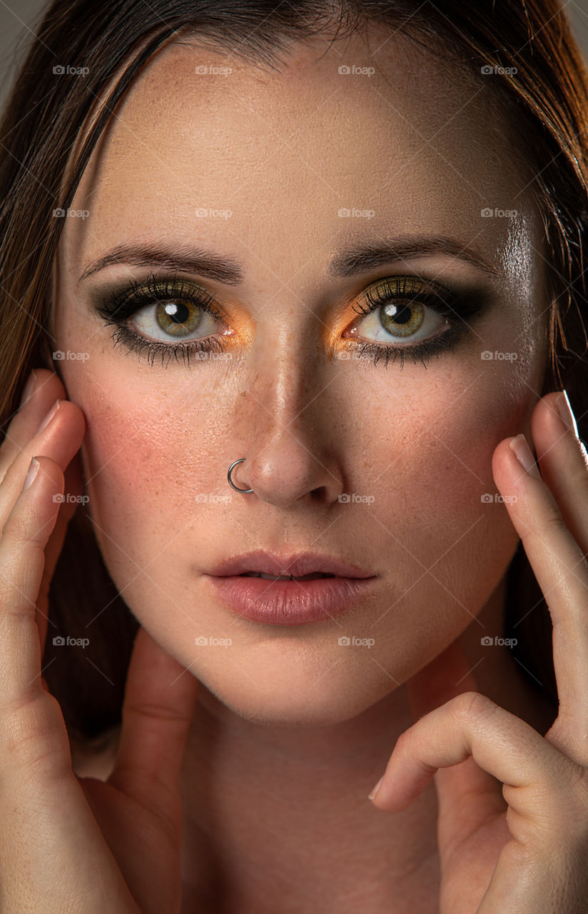 Gorgeous girl with freckles and green eyes. 