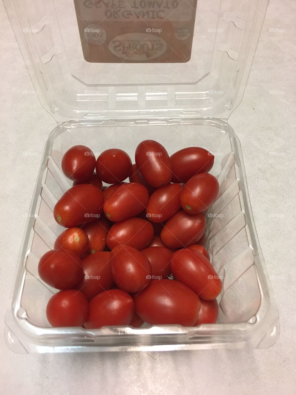 Tomatoes in container