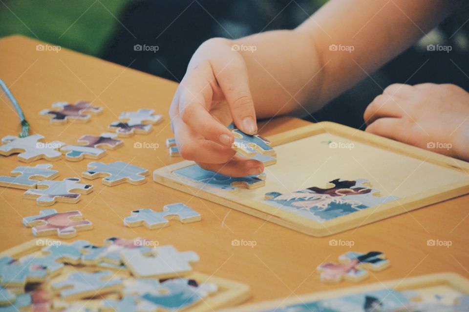 Child doing puzzle