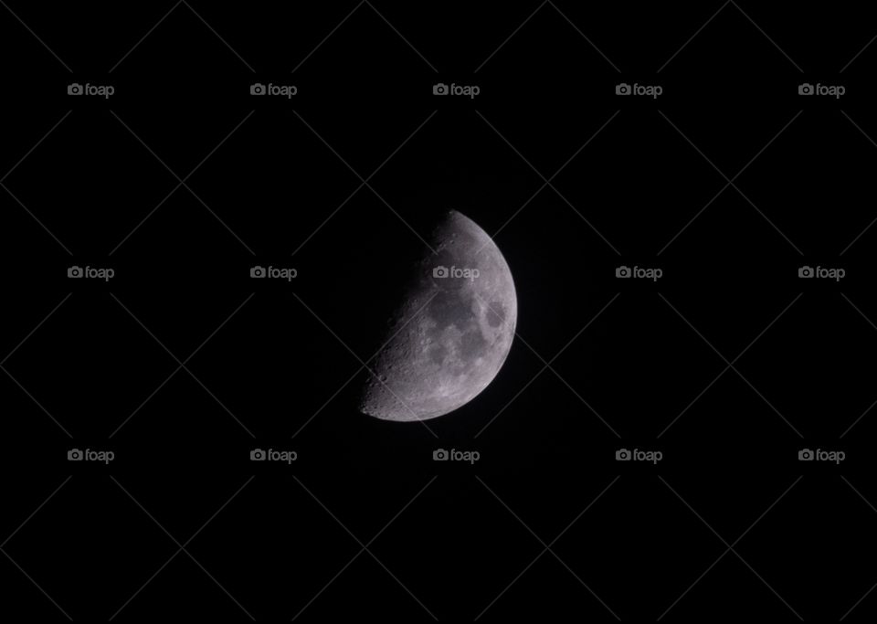 Really beautiful half moon charming on the sky over Bangkok Thailand