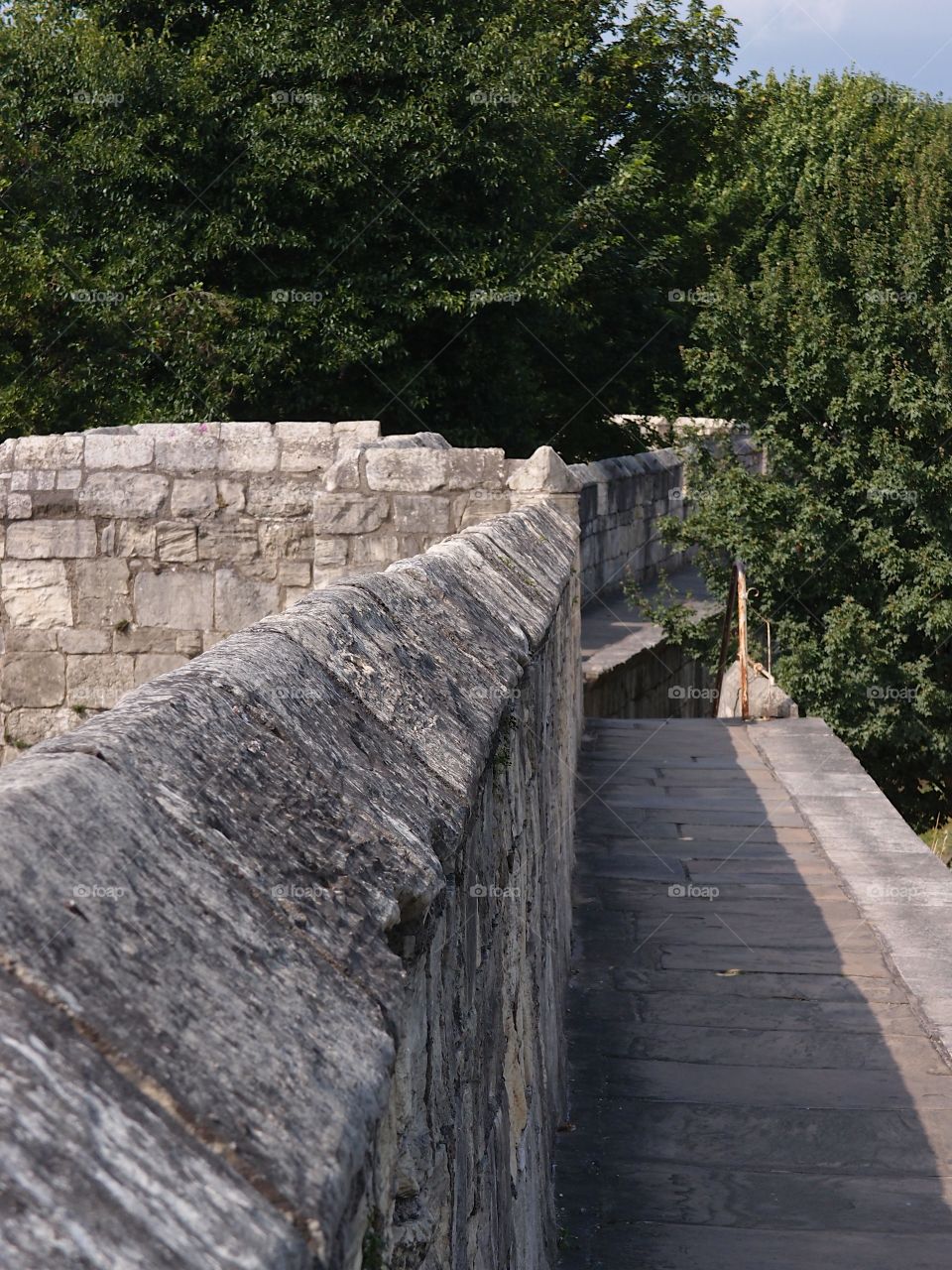 The historic fortified York Wall made of massive stone and a nice walkway surround the older parts of the city. 