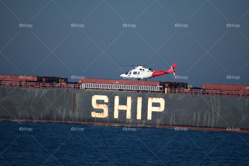 A Rescue Helicoper Landed On A Ship