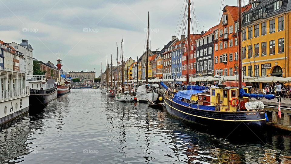 Old colorful houses by a channel in Denmark