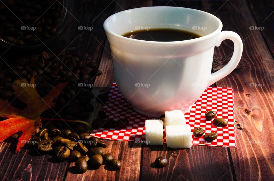 coffee been still life on wooden background