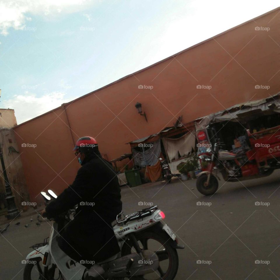 an adult man on his Motocycle