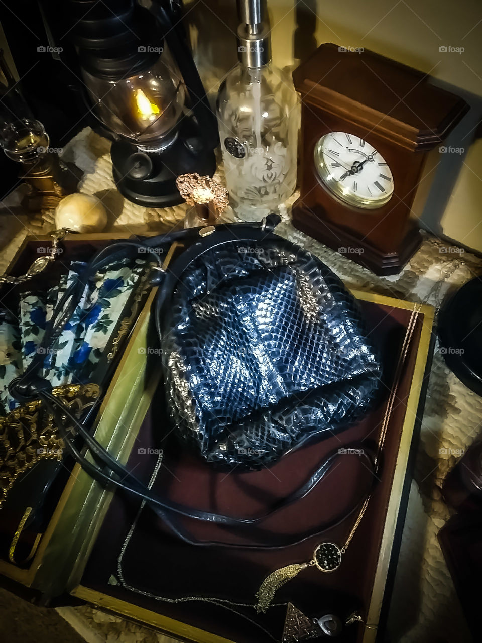 vintage women's black snakeskin leather 1930's era drawstring strap metal clasp handbag