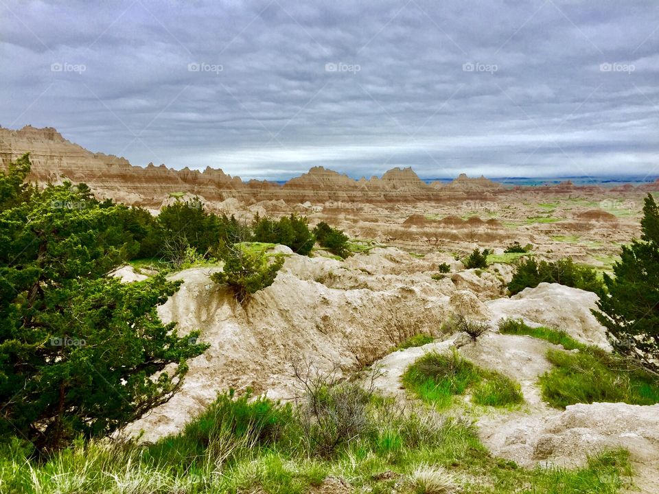 Hiking to view the beautiful canyons and prominent mountains with peaks @ Badlands National Park, SD, USA 