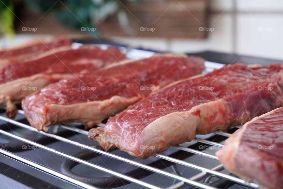 Barbecue at home in Brazil. Picanha is a cut of beef first made popular in Brazil, and later adopted in Portugal.
In the United States, the cut is little known and often named top sirloin cap, rump cover, rump cap, or culotte.