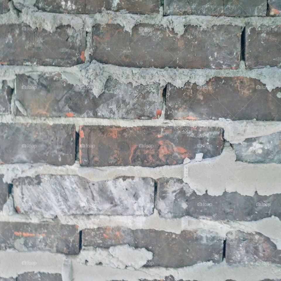 Another brick in the wall