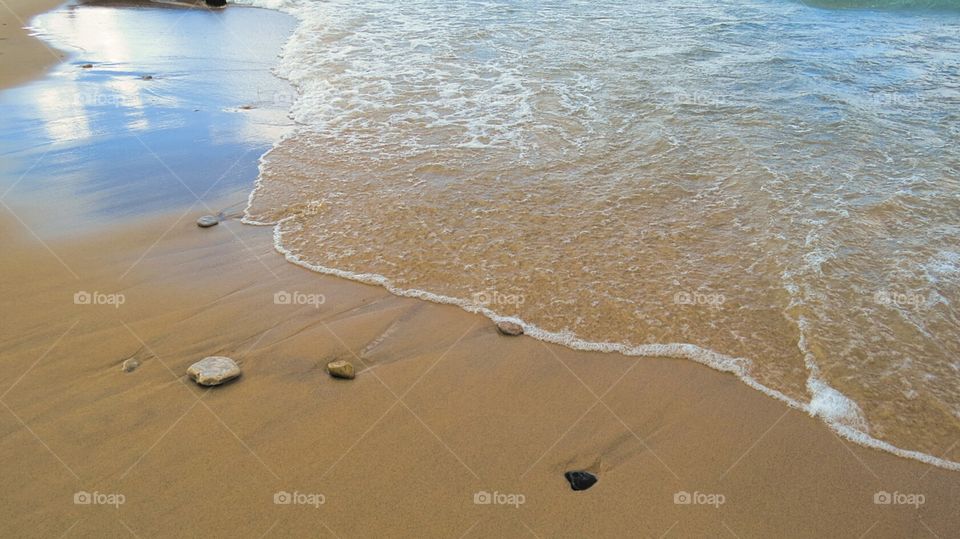 Waves on sand
