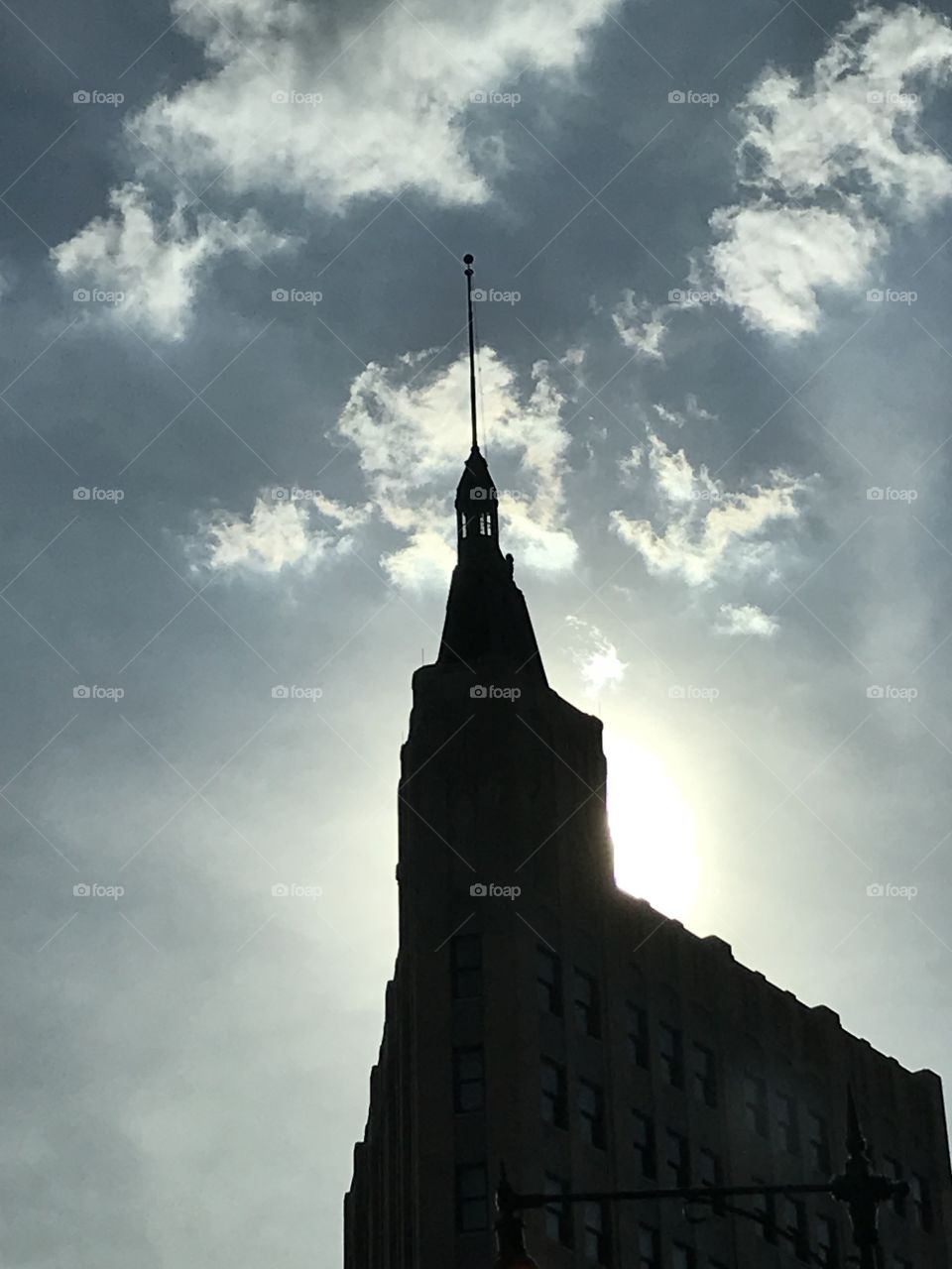 Shadowed building with the sun behind