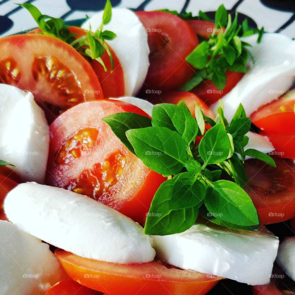 Tomatoes, basil and mozzarella, all fresh