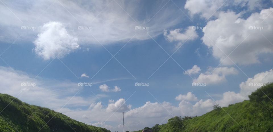 Green grass with Clouds