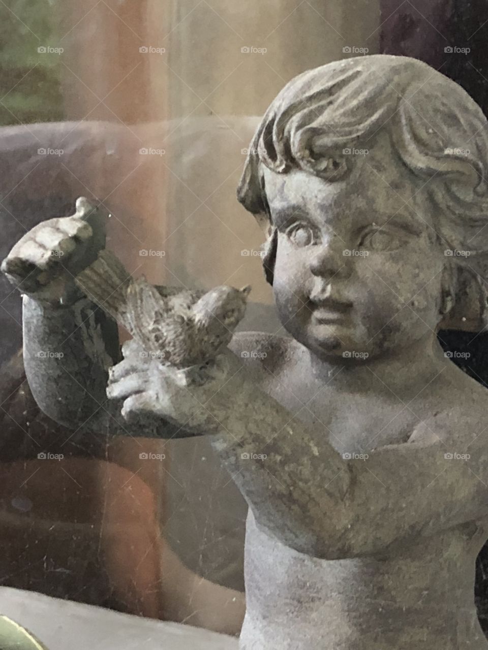 Garden angel with bird