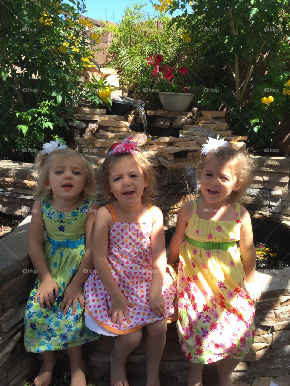 Portrait of a three smiling girls