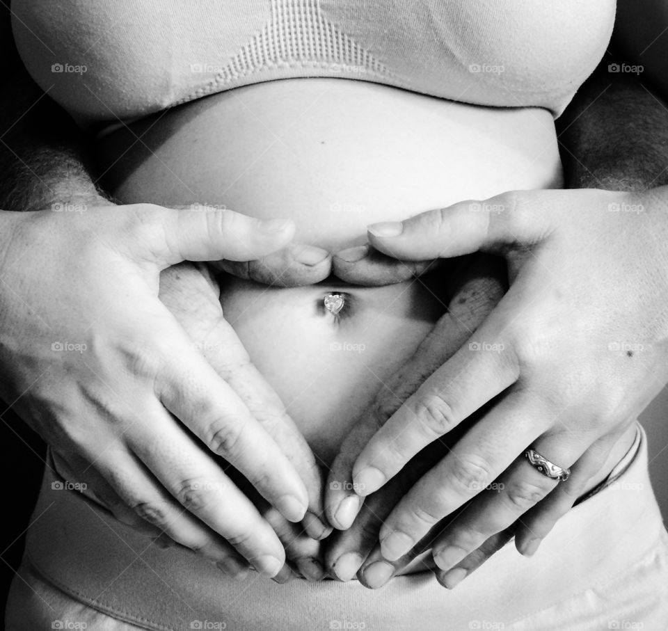 Hands on pregnant belly