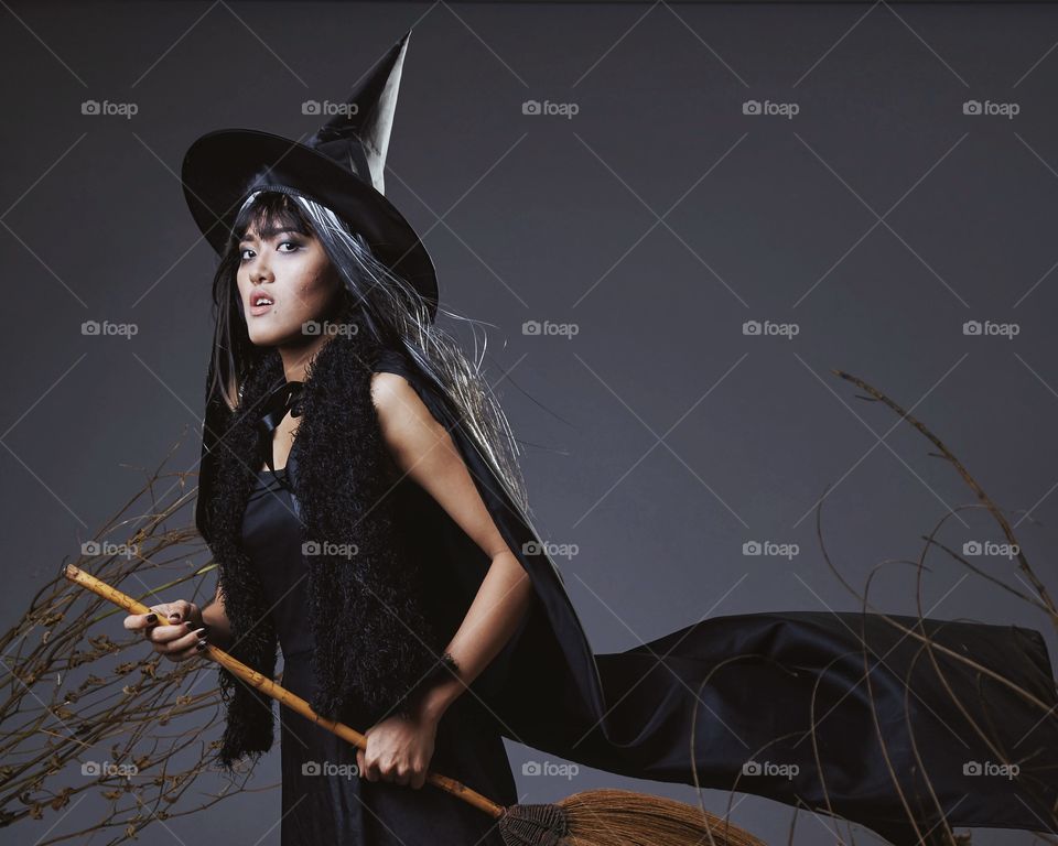 Witch flying on a broom 