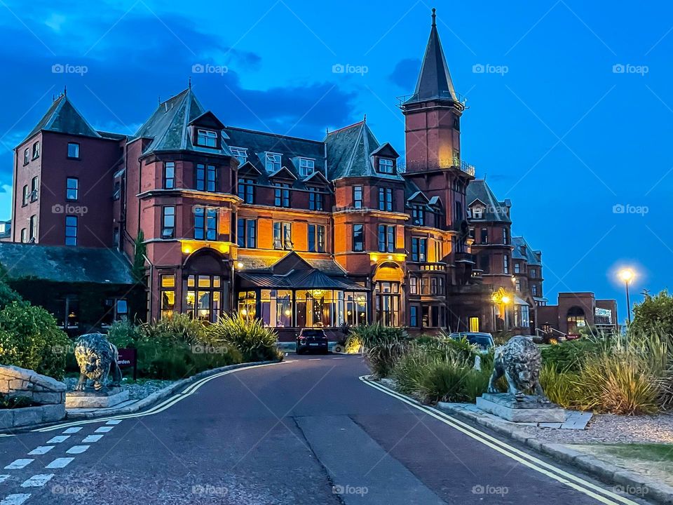 Lights illuminate the Victorian architecture at Slieve Donard in Northern Ireland.