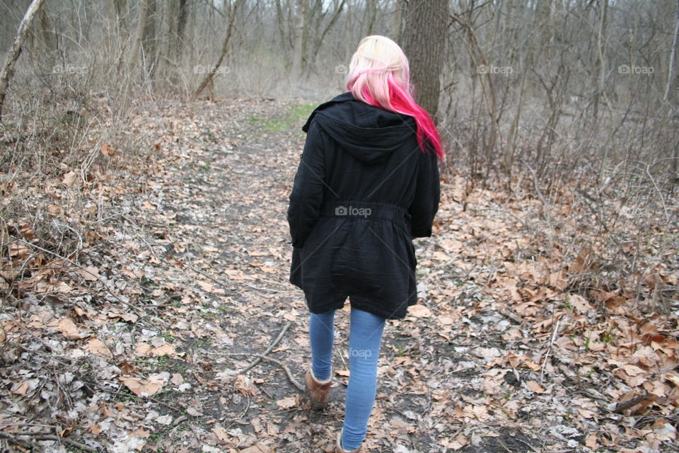 Walking through the woods at the end of winter