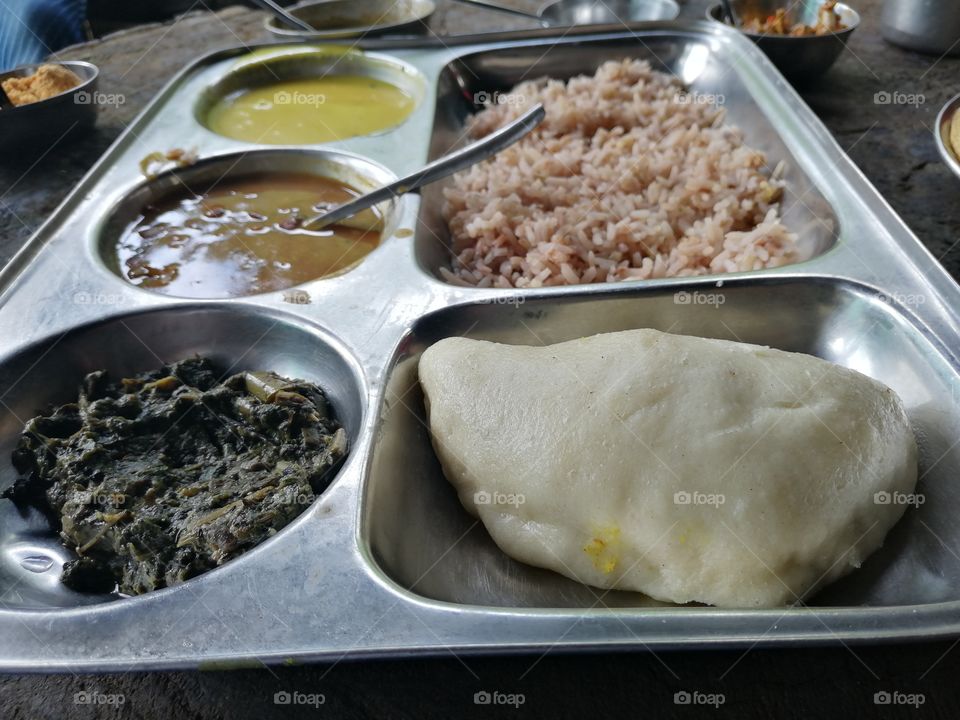Traditional Himachali or kull, Food plate contain Sidu ,Saag, Rajmahal,kari and Rice