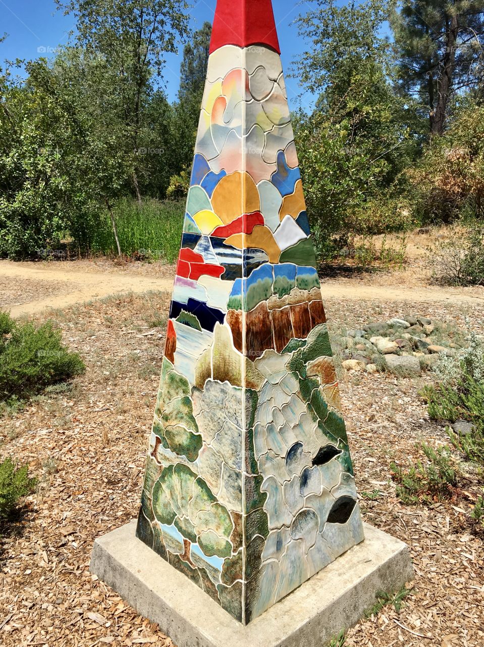 An artistic pyramid in the park made from tile 