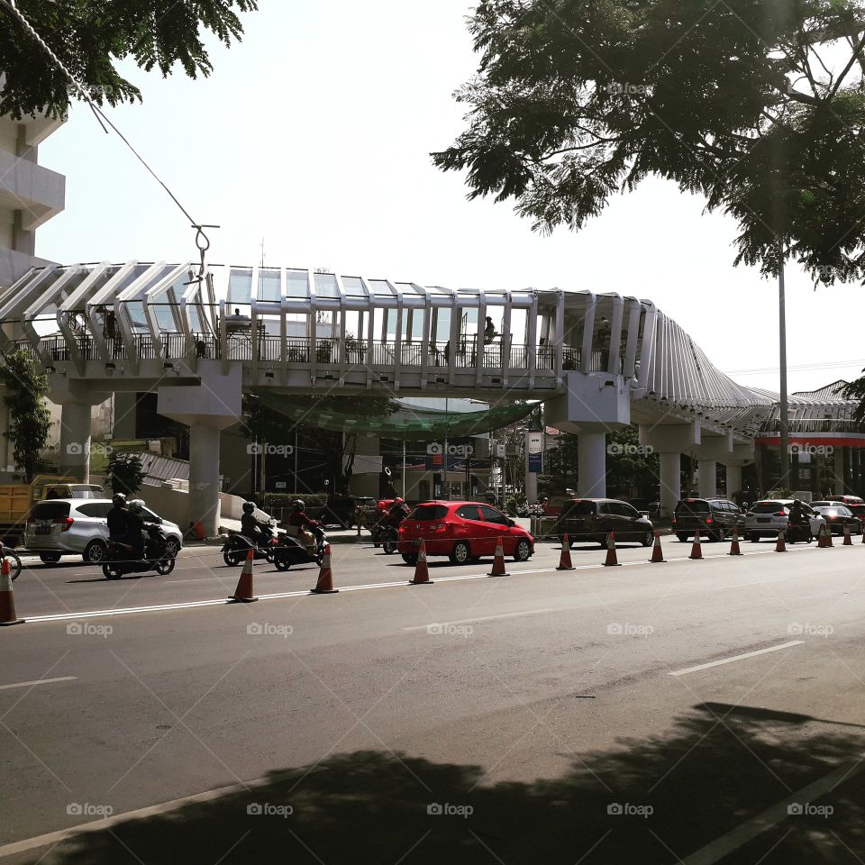 PEDESTRIAN BRIDGE WITH AN ATTRACTIVE DESIGN. 
Connecting the parking building and the center for selling souvenir in Semarang, Indonesia