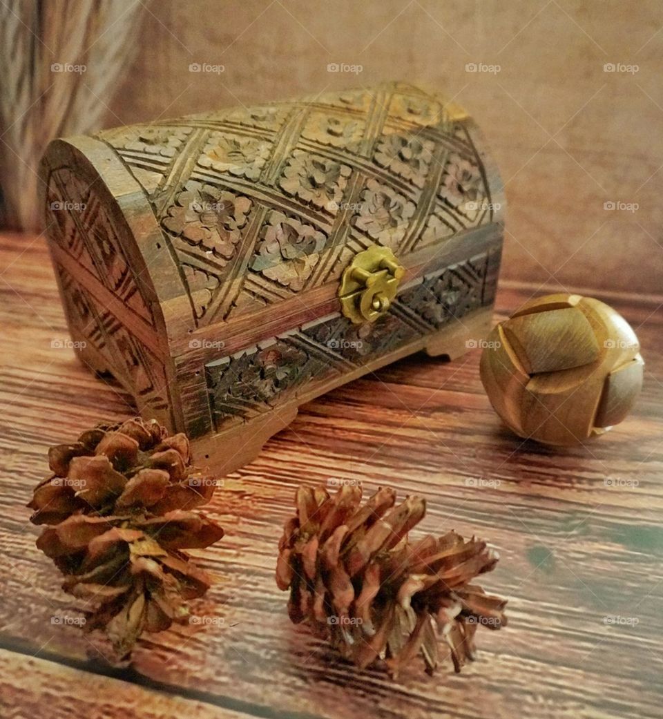 wooden box, woden ball and woden pine on the table - wood