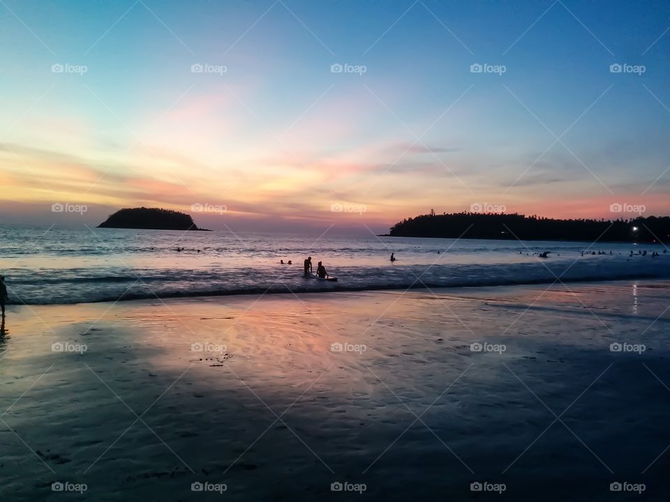 People enjoying at beach