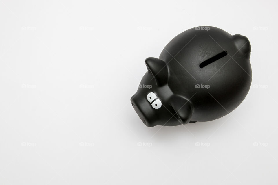 Black Piggy Bank Isolated In White Background
