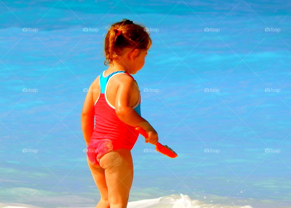 Where's My Pale?. the beaches of Hilton Head Island, South Carolina. the little girl is amazed at what she sees.