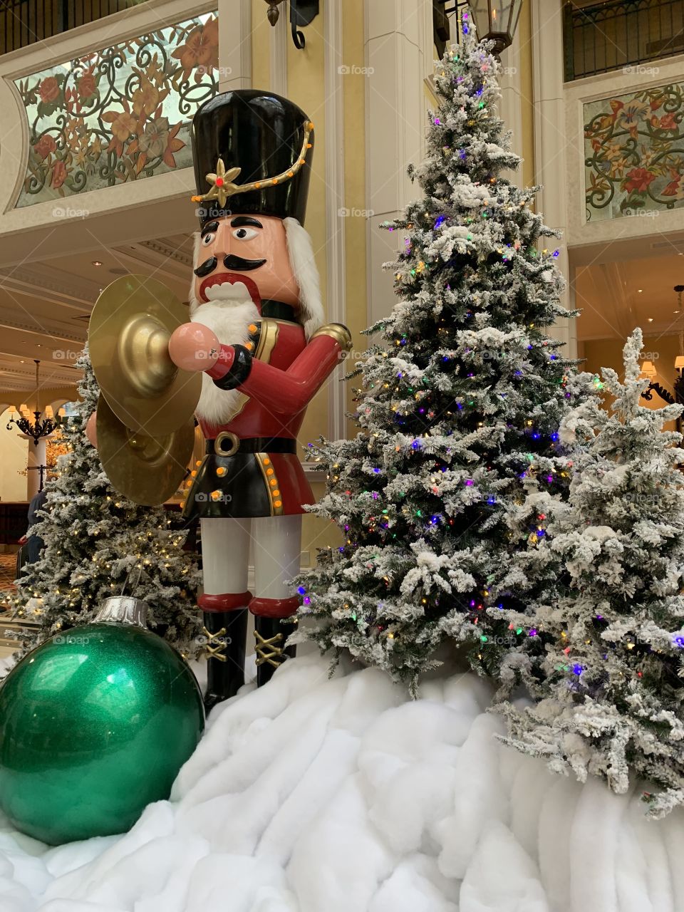 Decorating for Christmas. Large colorful decorations. The traditional colors of Christmas are pine green (evergreen), snow white, and heart red. Blue and white are often used to represent winter