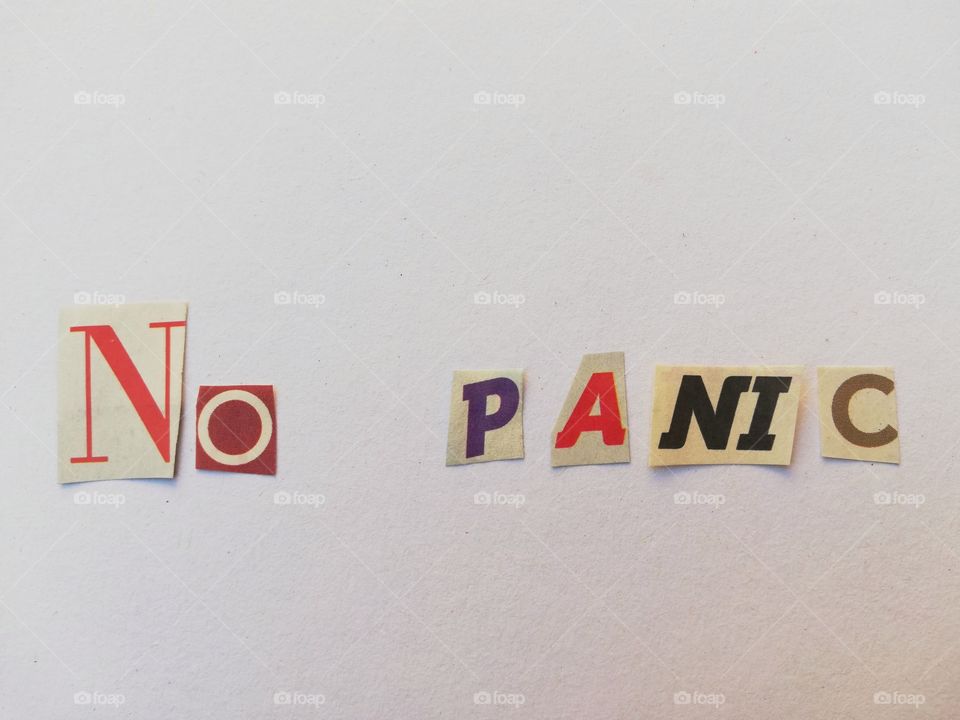 Inscription: "no panic" with newspaper clippings