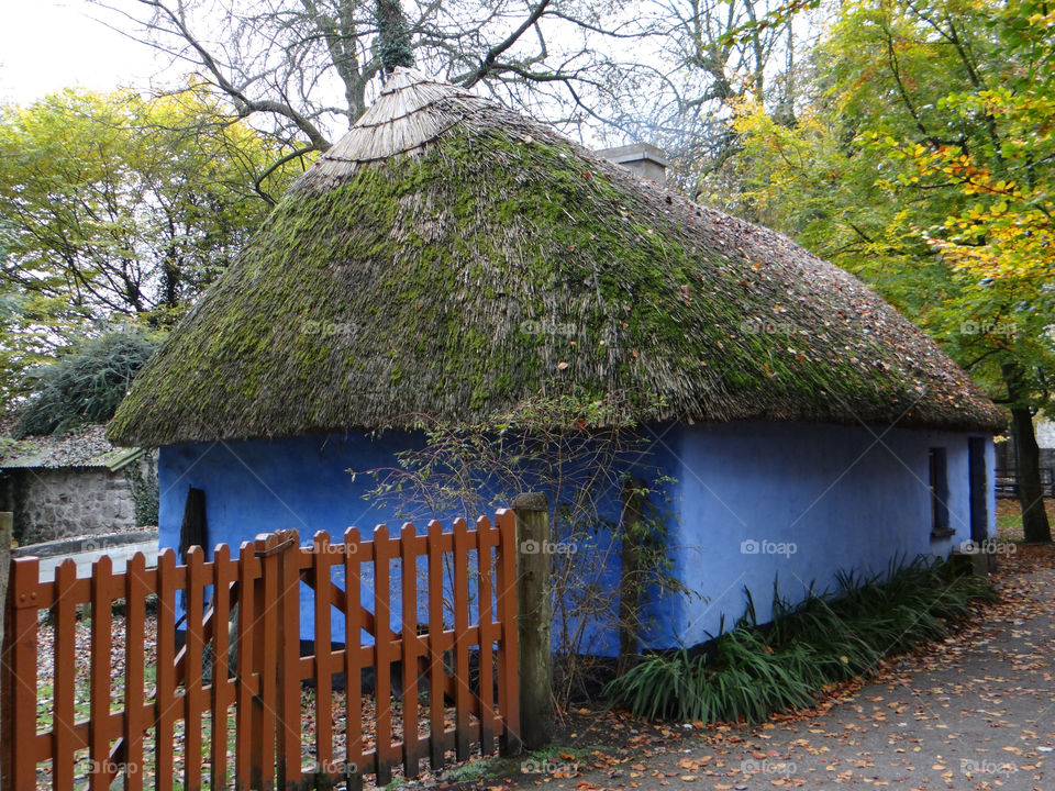 blue fence cottage roof by kshapley