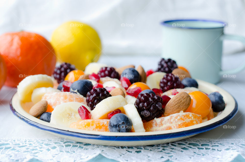 Fruits and nuts on breakfast