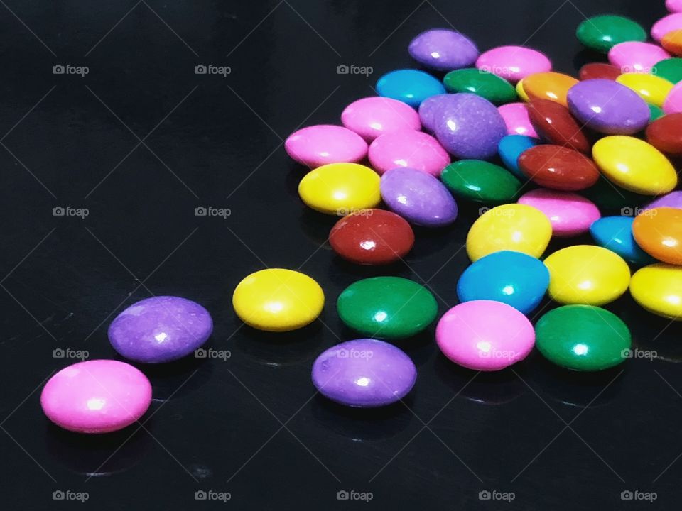 Candies love... little colored dots of chocolate. I am not sure if I eat them, or take a photo of them...