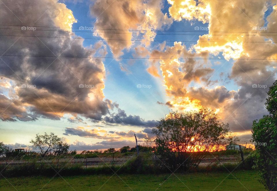 Scenic view of cloudy sky at sunset