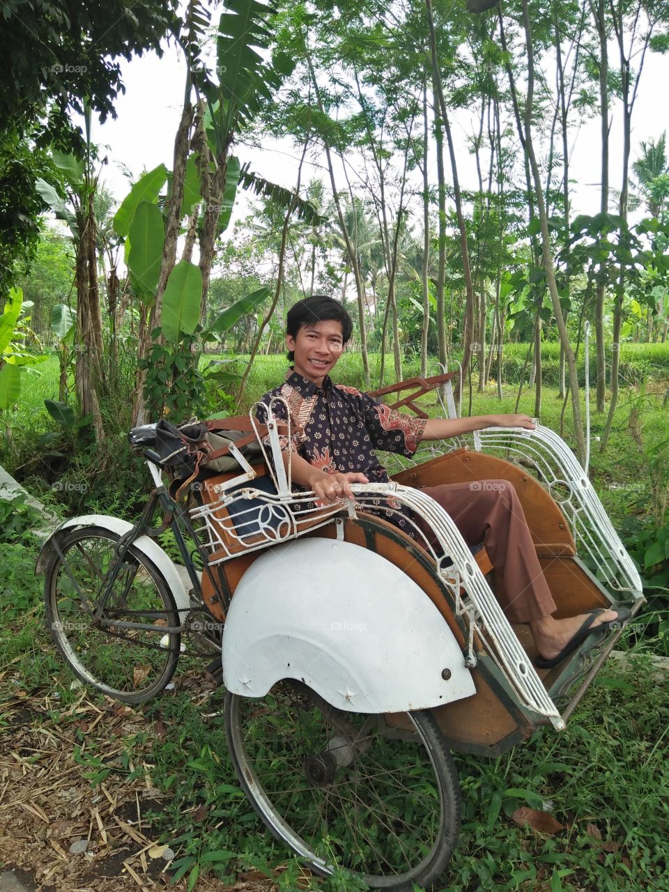 this is a traditional pedicab transportation , and do not forget to smile