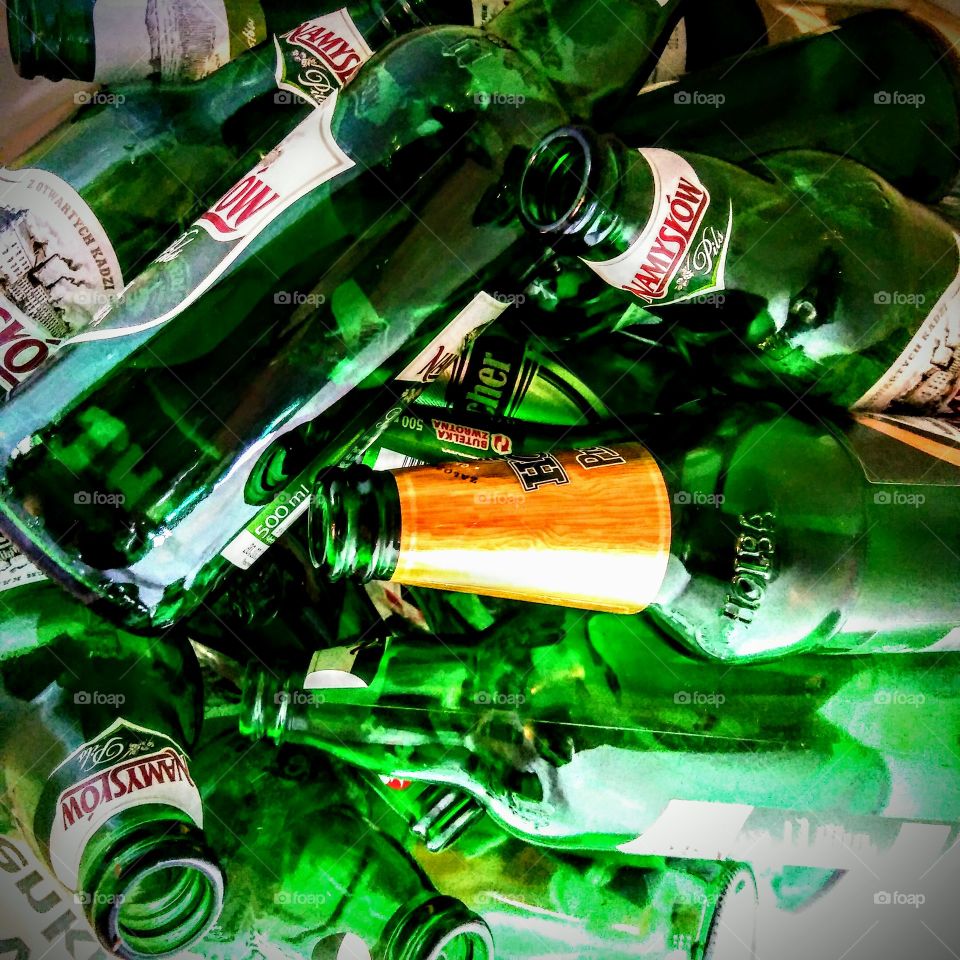 Green glass beer bottles.