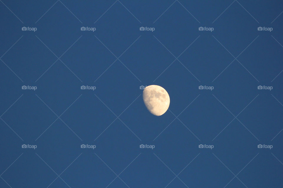 The moon against the background of the dark sky.