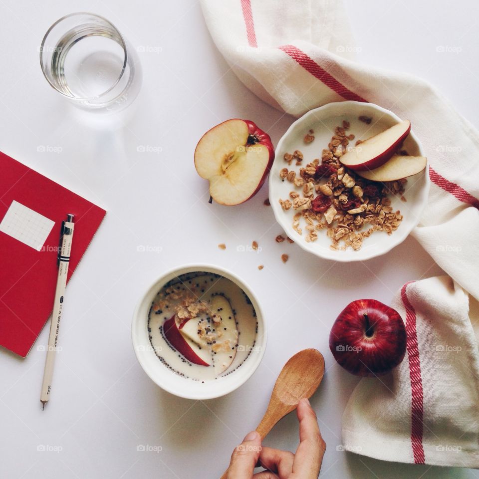 Red breakfast . Red breakfast with cranberry granola, poppy seed, apple and milk