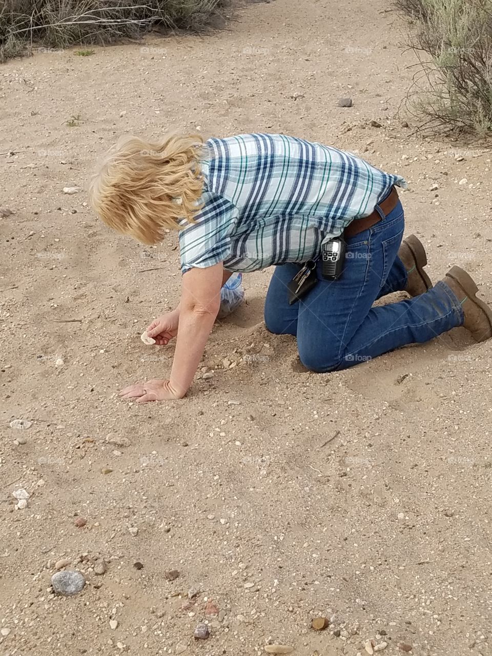 Woman Looking for Rocks